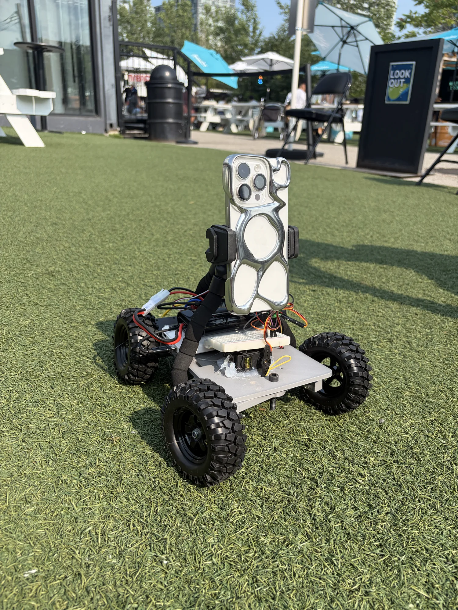 Completed Spark rover outdoors with phone-mounted spatial capture system